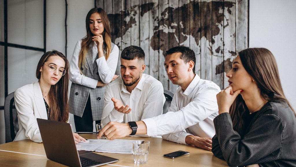 People in a room practicing group discussion